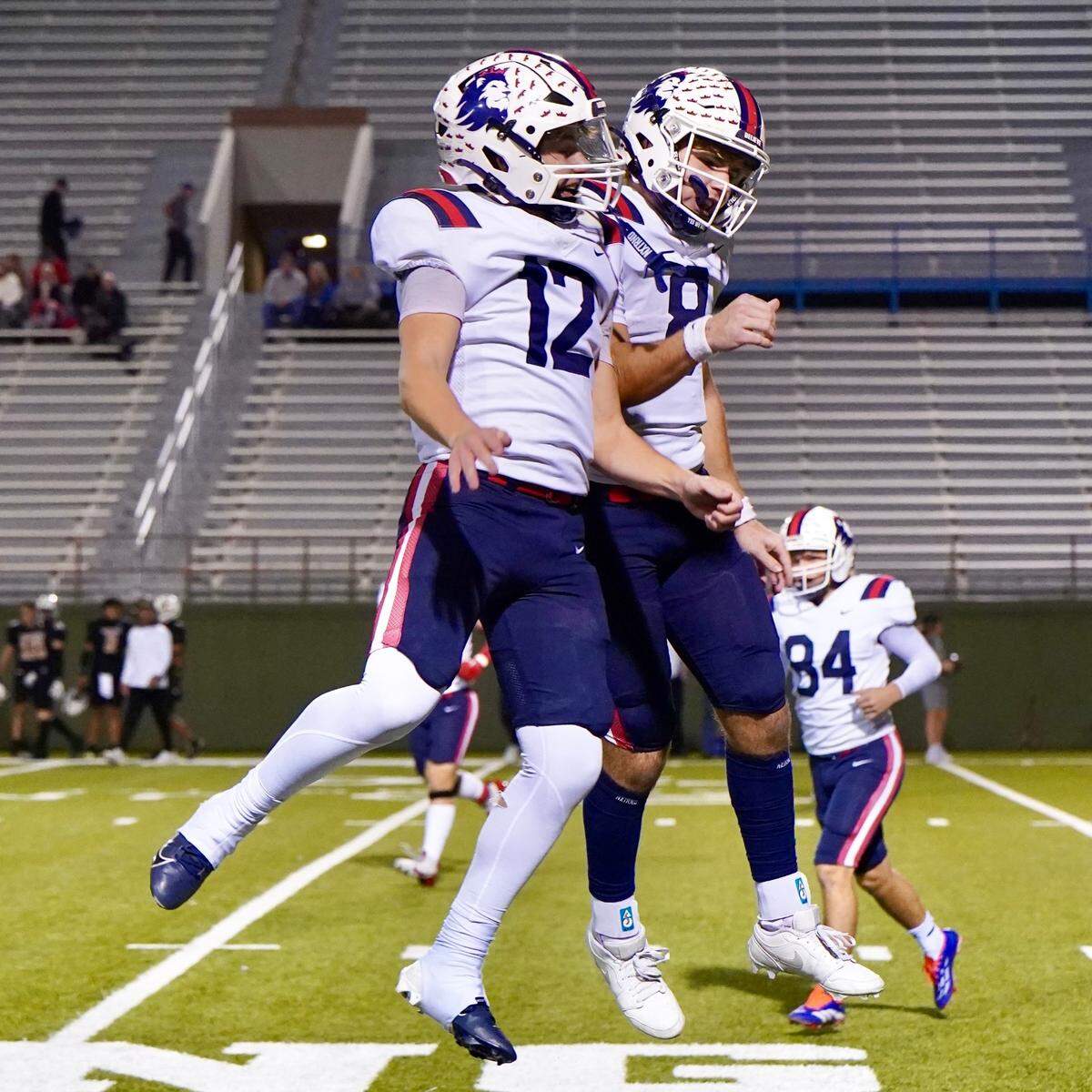 North Richland Hills Richland quarterback Drew Kates (8) celebrates a touchdown against Amarillo with his younger brother Brett Kates (12) in a Class 5A Division 1 area-round game on Saturday, Nov. 23, 2024 at Memorial Stadium in Wichita Falls, Texas.
