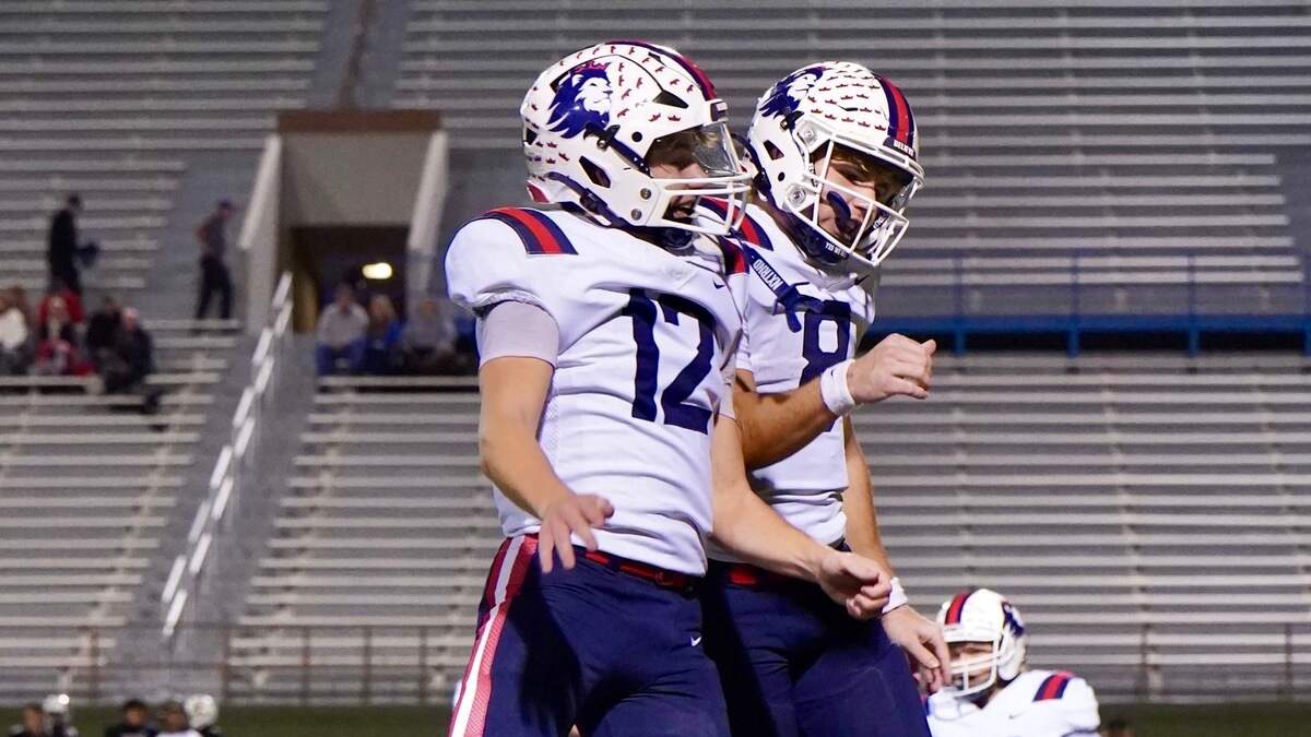 Richland quarterback Drew Kates (8) celebrates a touchdown against Amarillo with his younger brother, Brett Kates (12), in a Class 5A Division I area-round game on Saturday, Nov. 23, 2024, at Memorial Stadium in Wichita Falls.