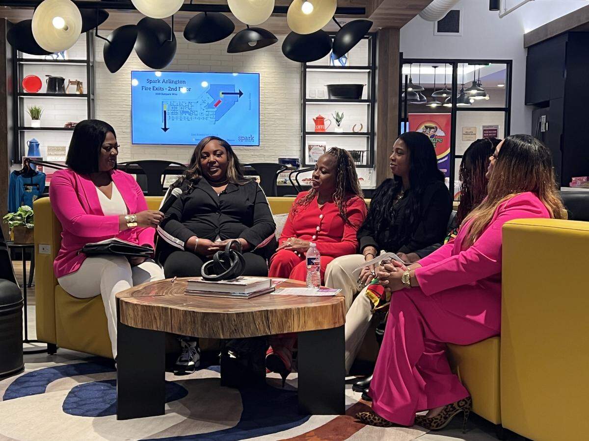 Jerletha McDonald of ADFW Family Child Care Network, left, moderates a panel discussion about child care entrepreneurship on Thursday, Nov. 20, 2025, at Spark coworking space in Arlington during Global Entrepreneur Week North Texas. The pictured panelists, from left to right, are child care providers from across Dallas-Fort Worth: Monicha Neal, Carmeia White, Danyell Smith, Roslyn Chaney and Wa’Keisha Chase.