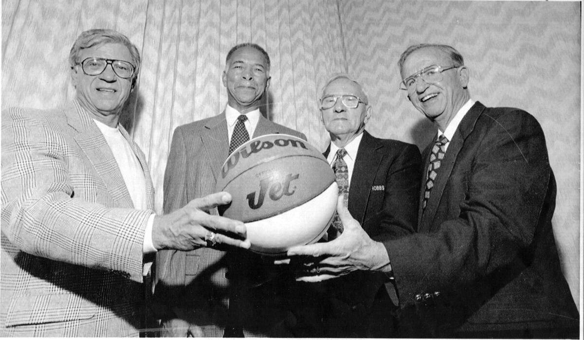 The four winningest high school basketball coaches in the country in 1995: Bill Kreuger, Clear Lake; Robert Hughes, Dunbar; Ralph Tasker, Hobbs, New Mexico; and Morgan Wooten, DeMatha Hyatssville, Maryland.
