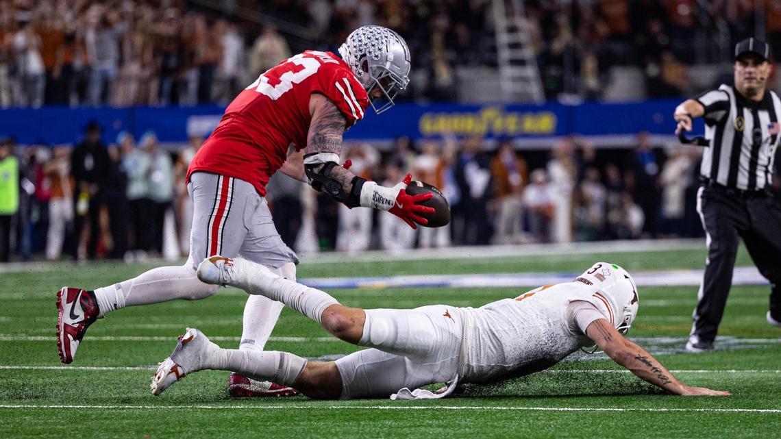 Ohio State defensive end Jack Sawyer (33) changed the Cotton Bowl with his sack and forced fumble of Texas quarterback Quinn Ewers late in the fourth quarter of Ohio State’s win of the national semifinals.