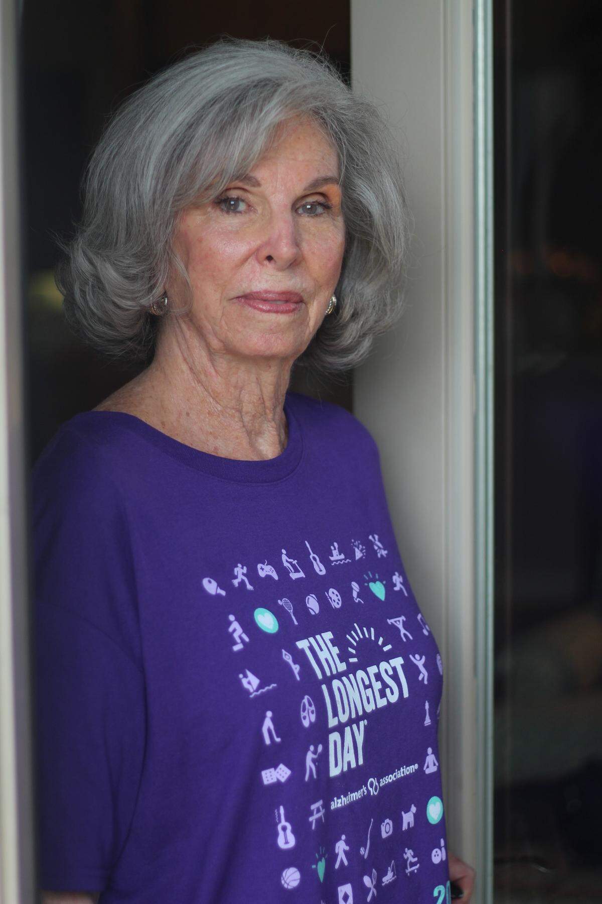 Jan Draper poses for a portrait in her home on Wednesday, June 20, 2018. As a widower, she is advocating for Alzheimer's patients and caregivers.