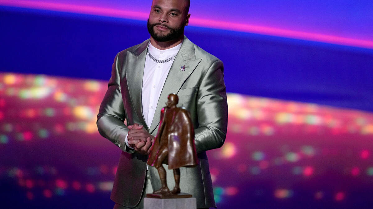 Walter Pyton Player of the Year Award winner, Dallas Cowboys’ Dak Prescott, speaks during the NFL Honors award show ahead of the Super Bowl 57 football game,Thursday, Feb. 9, 2023, in Phoenix.