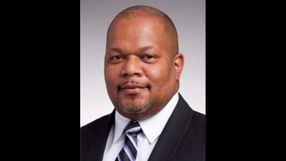 The head shot of a government official.