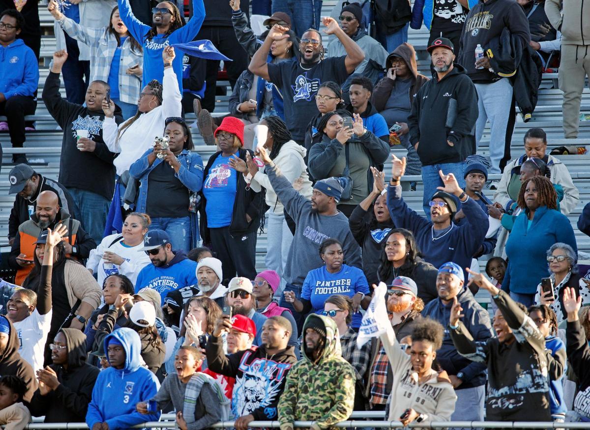 North Crowley fans cheer in a UIL Conference 6A Division 1 quarterfinal football playoff game at Dragon Stadium in Southlake, Texas, Saturday, Dec. 02, 2023.