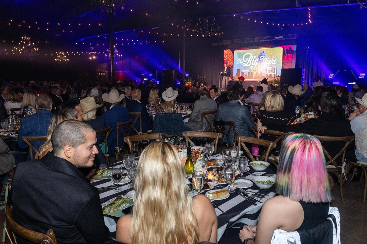 Hundreds of attendees sit for dinner at the The Big Good’s annual fundraiser ‘The Big Night’ at the River Ranch Stockyards in Fort Worth on Thursday, April 3, 2025.