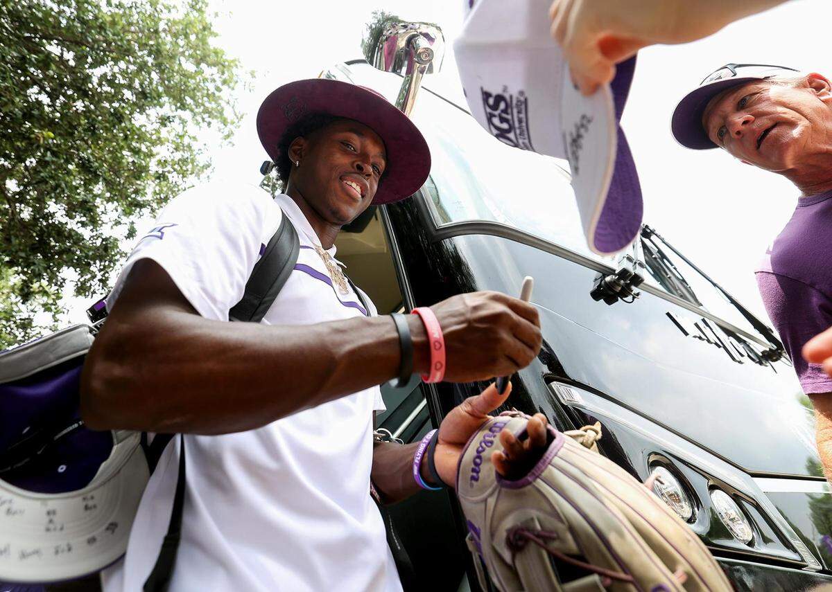 TCU outfielder Austin Davis signs autographs for fans before leaving Fort Worth for Omaha and the College World Series on Wednesday, June 14, 2023. TCU’s first opponent will be Oral Roberts University.