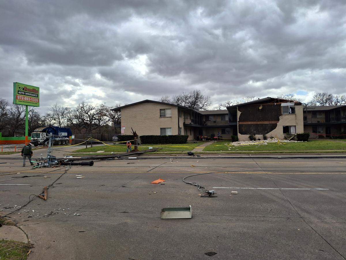 A tornado on Tuesday, March 4, ripped part of the roof and the facade from at least one building at Las Haciendas Apartments in Irving.