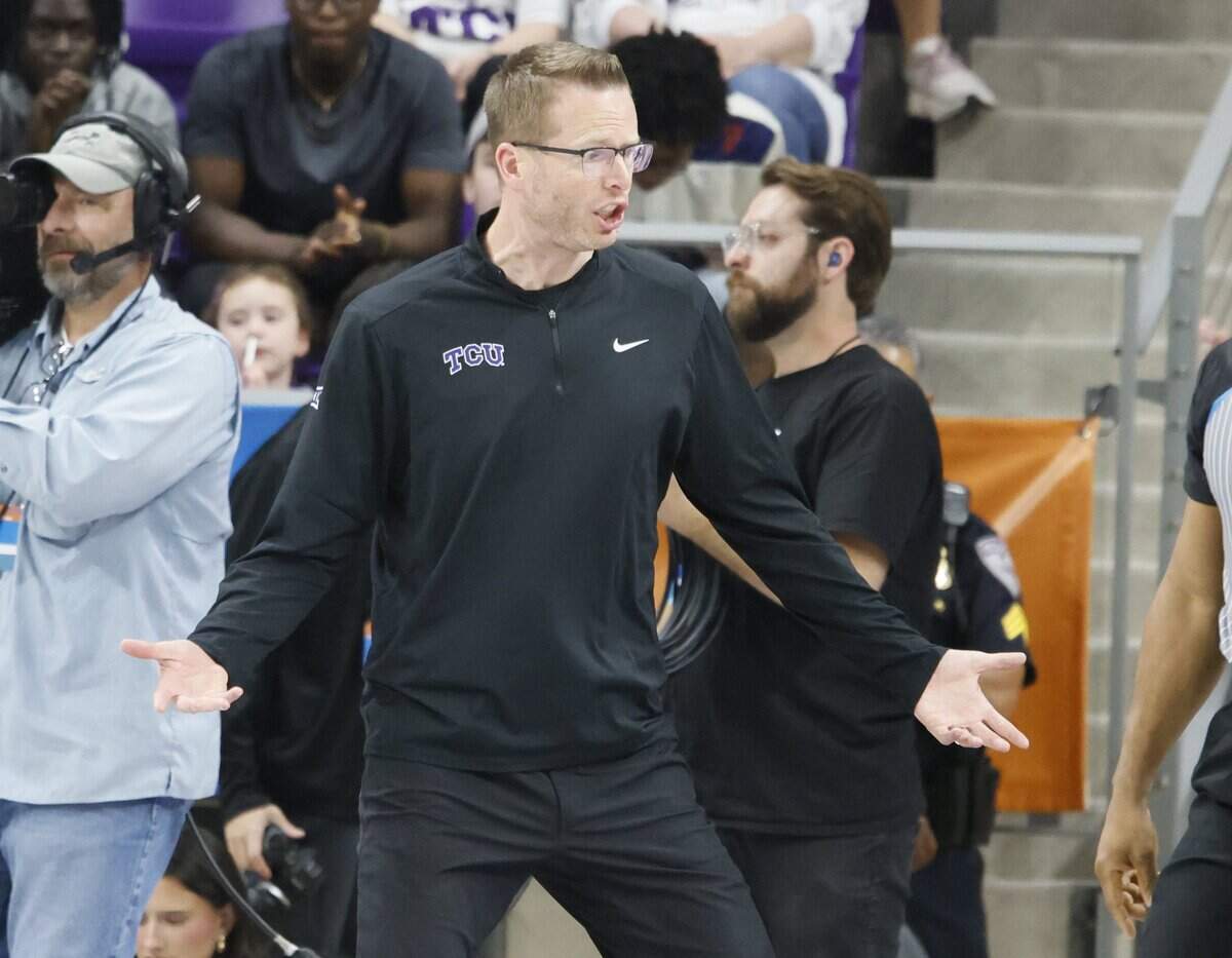 TCU head coach Mark Campbell goes to the paint to offer some tips to TCU center Clara Silva (17) during the first half of a second round NCAA Division I Women's Basketball Championship game at Schollmeier Arena in Fort Worth, Texas, Sunday, March, 22, 2026.