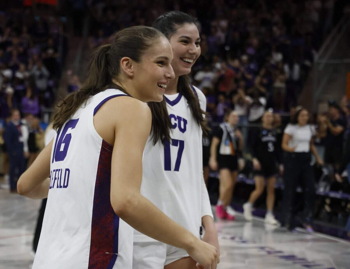 TCU guard Clara Bielefeld (16) and center Clara Silva (17) are all smiles after overtime against Washington of a second round NCAA Division I Women's Basketball Championship game at Schollmeier Arena in Fort Worth, Texas, Sunday, March, 22, 2026.