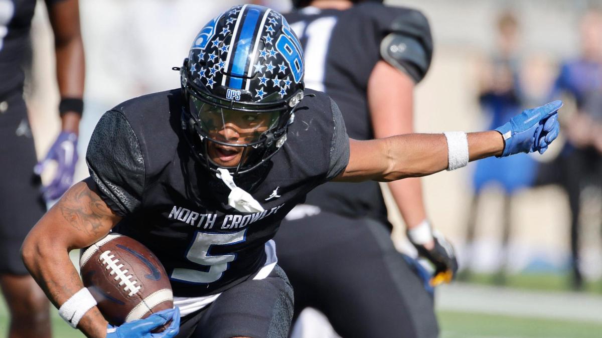 North Crowley’s Daniel Bray regains his balance en route to a 59 yard touchdown during a UIL Class 6A D1 Bi-district playoff football game at Crowley ISD Multi-Purpose Stadium in Fort Worth, Texas, Saturday, Nov. 16, 2024.
