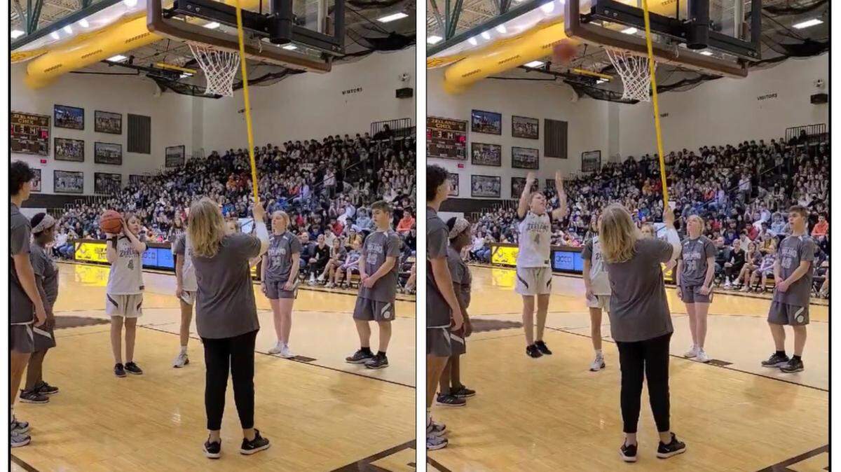 Zeeland East High School 11th grader Jules Hoogland banks jump shot in front of a sold-out crowd.