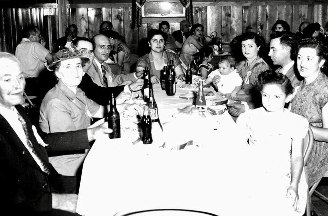 The Phiripes family, founders of George’s Cash & Carry import grocery, at a family baptism on May 17, 1953.