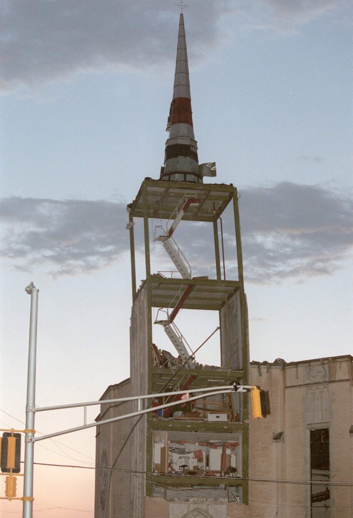 The tornado ripped into Calvary Cathedral International and its prayer tower (steeple).