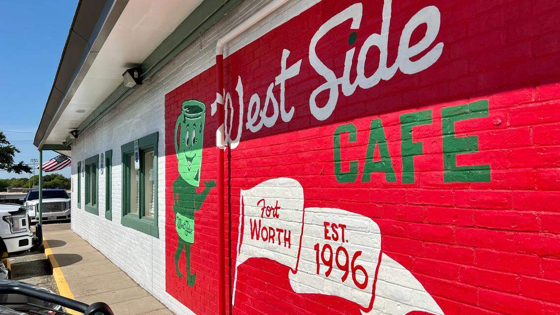 A new mural by artist Matt Cliff decorates the wall at West Side Cafe.