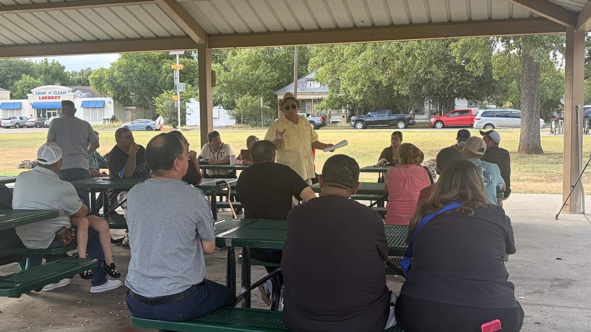 Angel Garza held a meeting at Marine Park on Monday evening about a new Texas law that would make it more expensive to operate mobile food vendors.