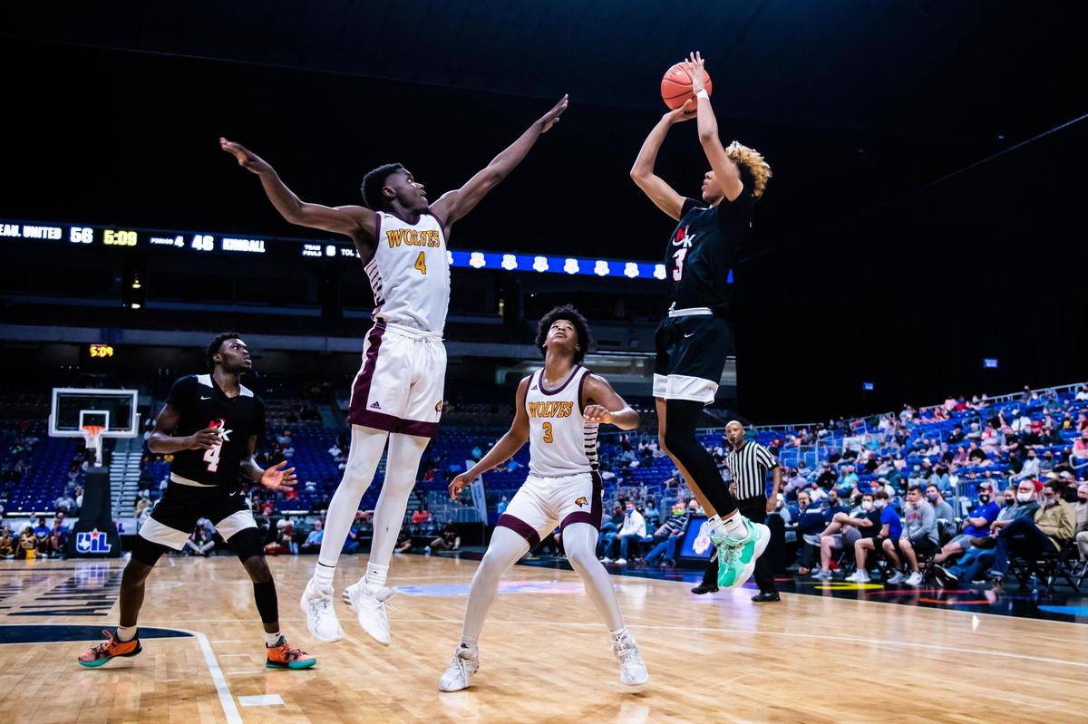 Chancey Gibson (3) shoots while being guarded by Trealyn Porchia during the 5A state final between Beaumont United and Dallas Kimball at the Alamodome in San Antonio Texas, on March 12, 2021. Beaumont United went on to win 71-70 in overtime. (Photo by Matt Smith. Special to the Star-Telegram).