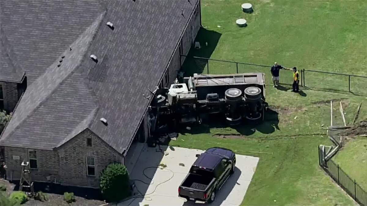 Three people were injured when a dump truck crashed through the wall of a home in northern Tarrant County, Texas, on Friday morning, May 30, the Tarrant County Sheriff’s Office said.