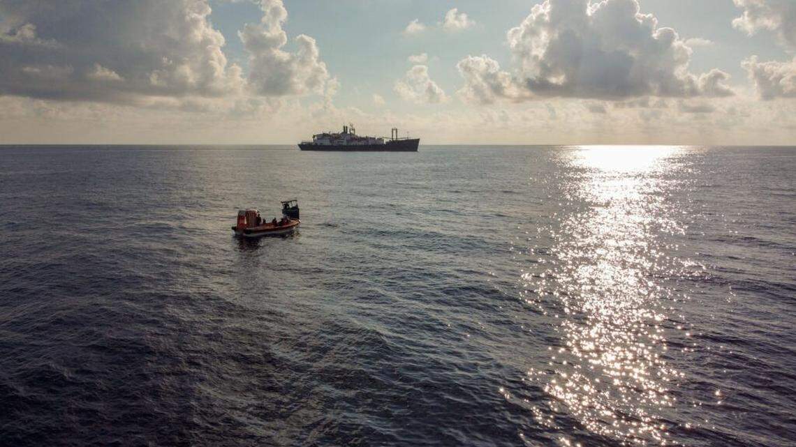 Three people stranded at sea for 15 days were spotted by Texas A&M student cadets on a vessel traveling from Texas to Florida, the school said. 