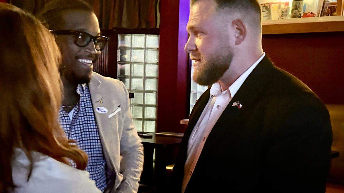 Democrat Taylor Rehmet meets with supporters at his watch party at Nickel City in Fort Worth on Tuesday, Nov. 4, 2025. Rehmet is headed for a runoff for the District 9 Senate seat.