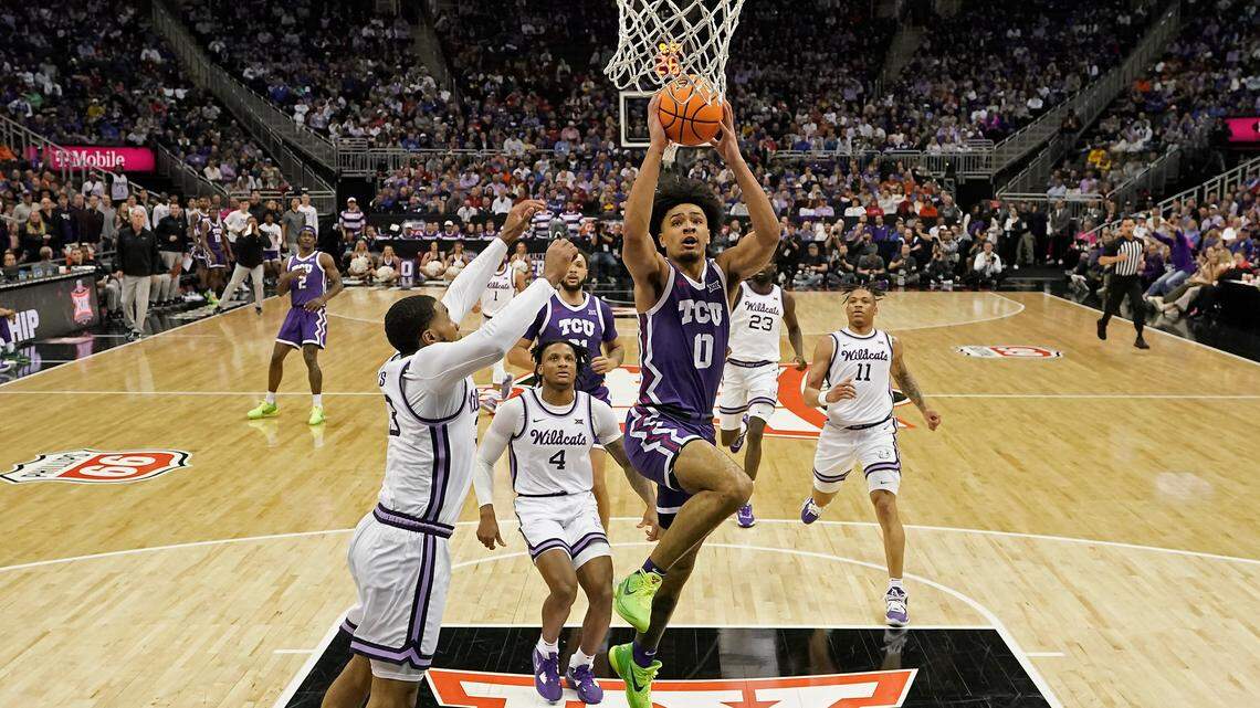 TCU guard Micah Peavy (0) puts up a shot during the first half of an NCAA college basketball game against Kansas State in the second round of the Big 12 Conference tournament Thursday, March 9, 2023, in Kansas City, Mo. (AP Photo/Charlie Riedel)