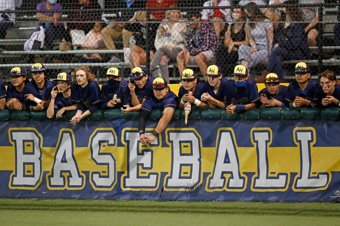 Arlington Heights players watch the action during the fifth annual Drew Medford Memorial Tournament on March 13, 2021, at Arlington Heights High School. Paschal defeated Arlington Heights 3-1 in the final game of the tournament.