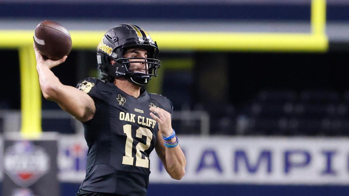 South Oak Cliff quarterback Carter Kopecky (12) tosses to the outside during the UIL 5A D2 State Championship football game at AT&T Stadium in Arlington, Texas, Friday, Dec. 20, 2024.