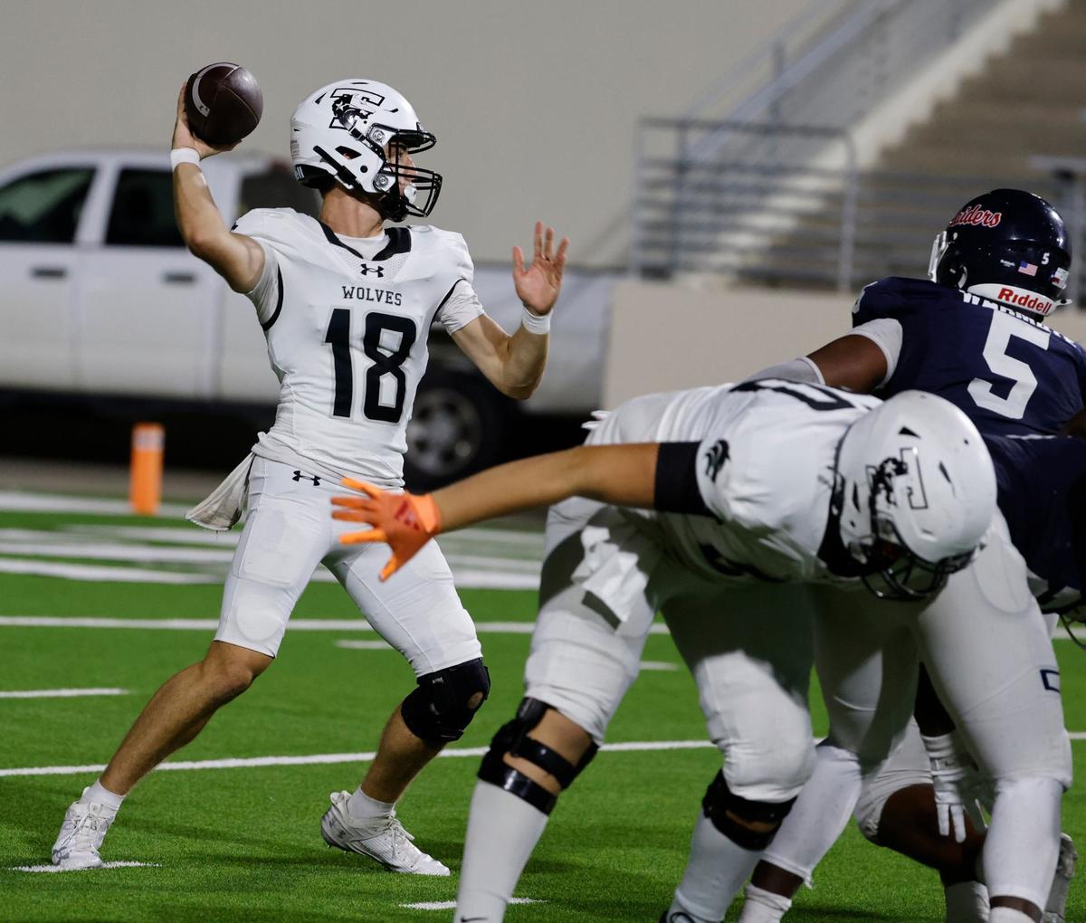 Timberview quarterback Casen Cappelletti (18) completes a pass in the second quarter during a UIL football game at C.H. Collins Activity Complex in Denton, Texas, Thursday, Sept. 05, 2024.