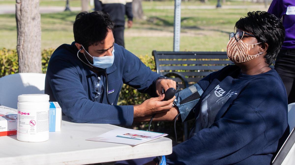 Jessica Jackson has her blood pressure checked at a free pop-up clinic in March 2021. The city is hosting another clinic in East Fort Worth this Saturday.