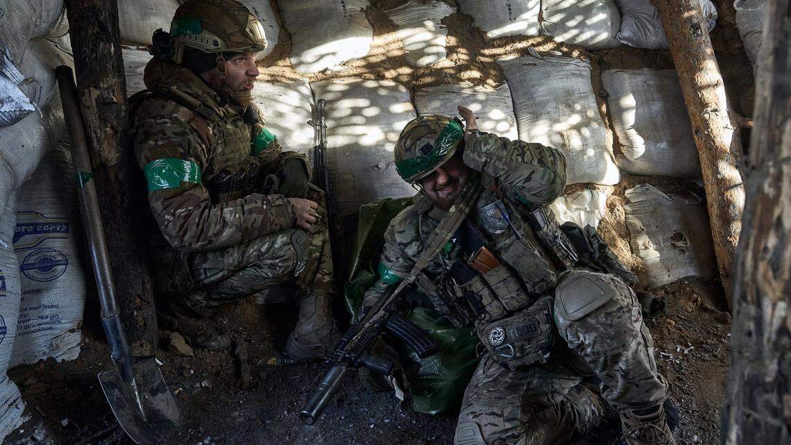 Soldiers of the Ukrainian National Guard hold their positions in the snow-covered Serebryan Forest on Jan. 12, 2024, in Kreminna, Donetsk Oblast, Ukraine. (Kostiantyn Liberov/Libkos/Getty Images/TNS)