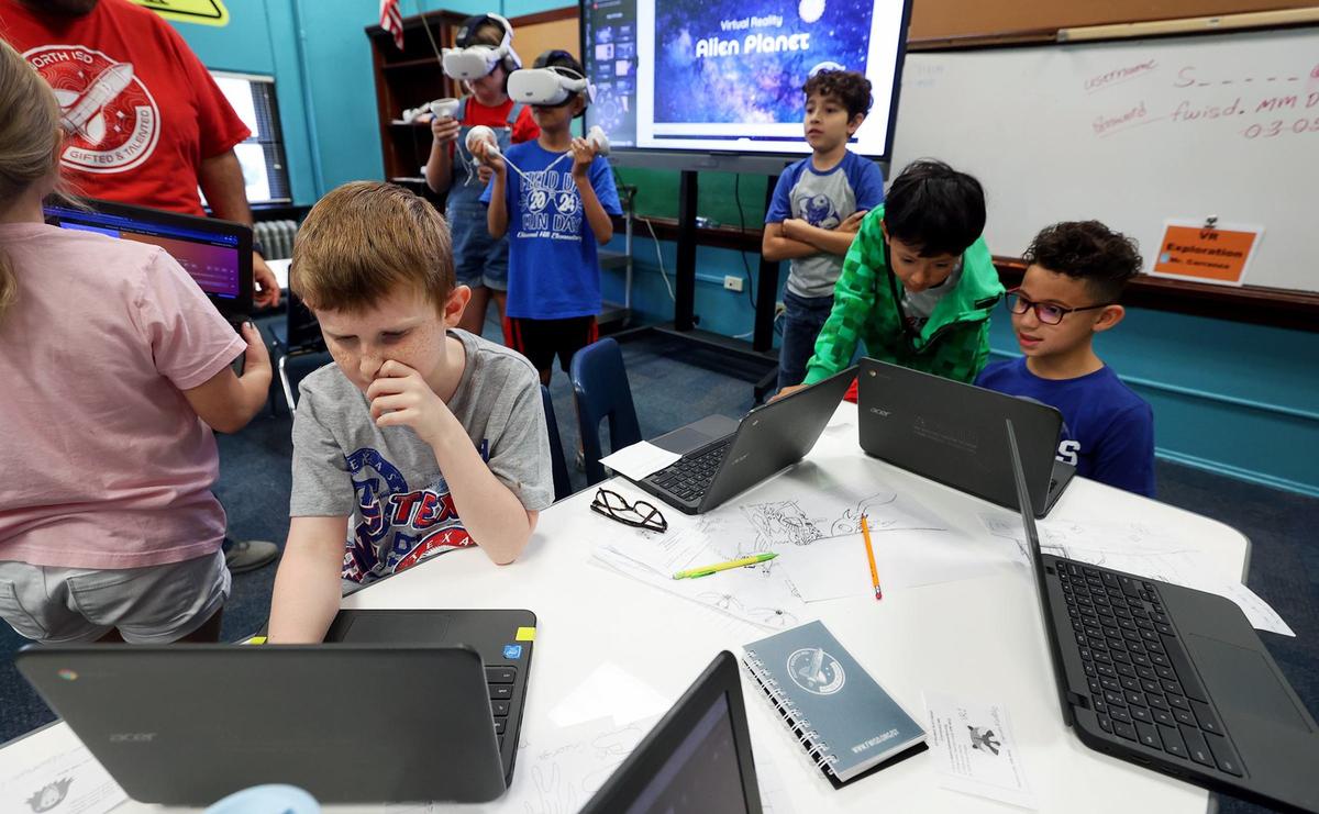 Children create their own virtual reality world during a summer enrichment camp at Rufino Mendoza Elementary School on June 12 in Fort Worth. The four-day camp was for students identified as gifted and talented and had a range of creative, STEM and critical thinking activities.