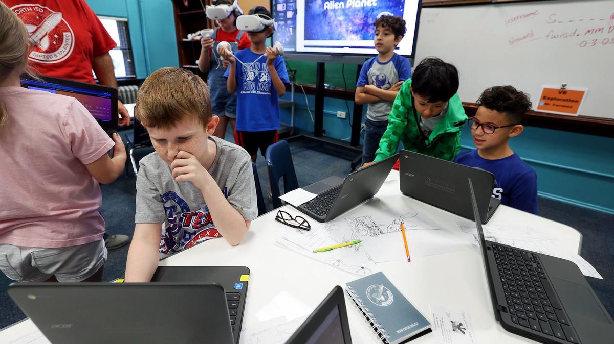 Children create their own virtual reality at a summer enrichment camp at Rufino Mendoza Elementary School in Fort Worth, Texas. The four-day camp was for Hispanic and other students identified as gifted in STEM studies.