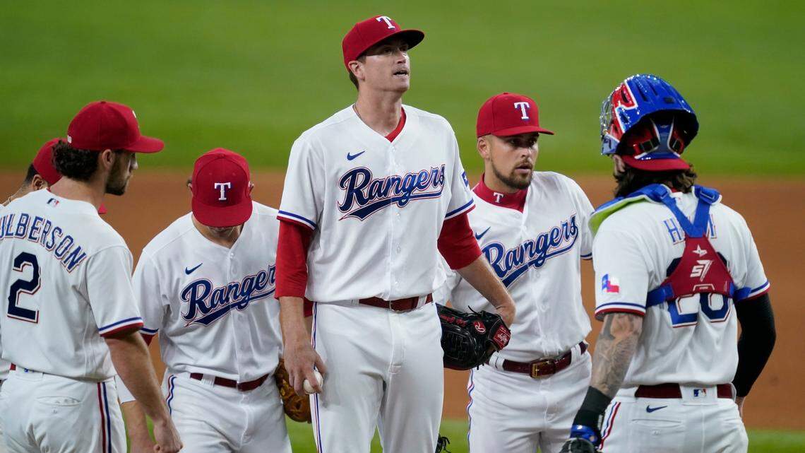 Texas Rangers starting pitcher Kyle Gibson, center, was traded along with closer Ian Kennedy and prospect Hans Crouse to the Philadelphia Phillies for right-hander Spencer Howard and two minor league pitchers on Friday.