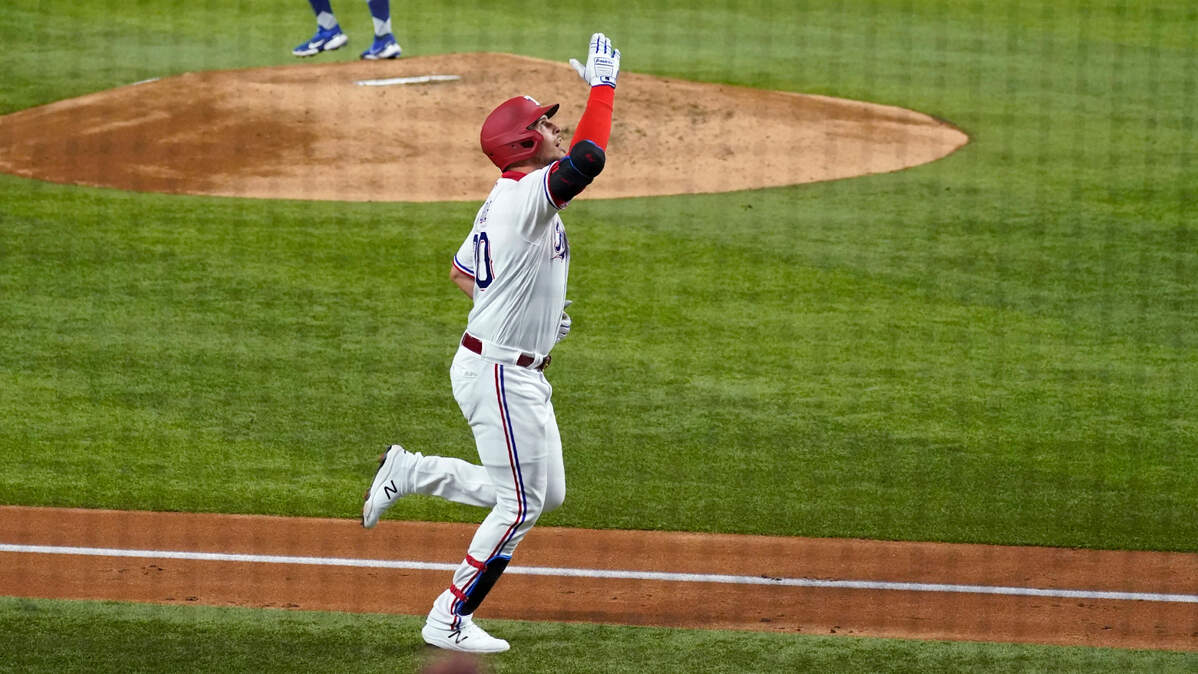 Nate Lowe celebrates his second two-run home run off Toronto Blue Jays starting pitcher Tanner Roark in the third inning Tuesday night at Globe Life Field in Arlington. The Rangers combined for four homers in their 7-4 win.