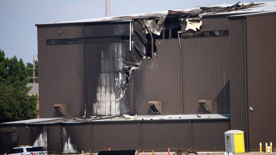 10 dead after small plane crashes into hangar at North Texas airport