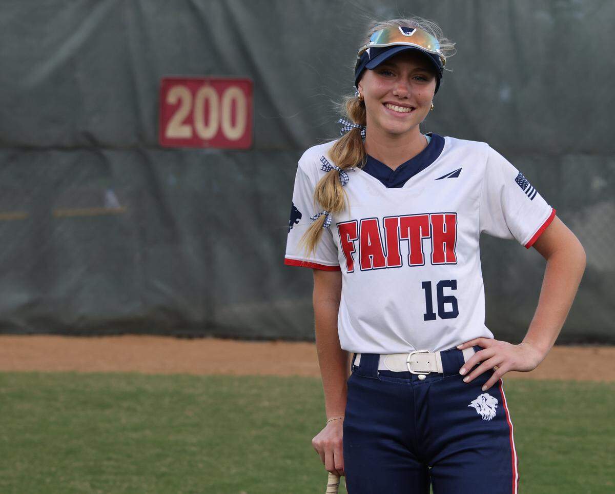 Grapevine Faith center fielder Michaela Hamilton is photgraphed in center field after winning a softball game at Oak Grove Park in Grapevine, Tx. Tuesday, March 31, 2026
