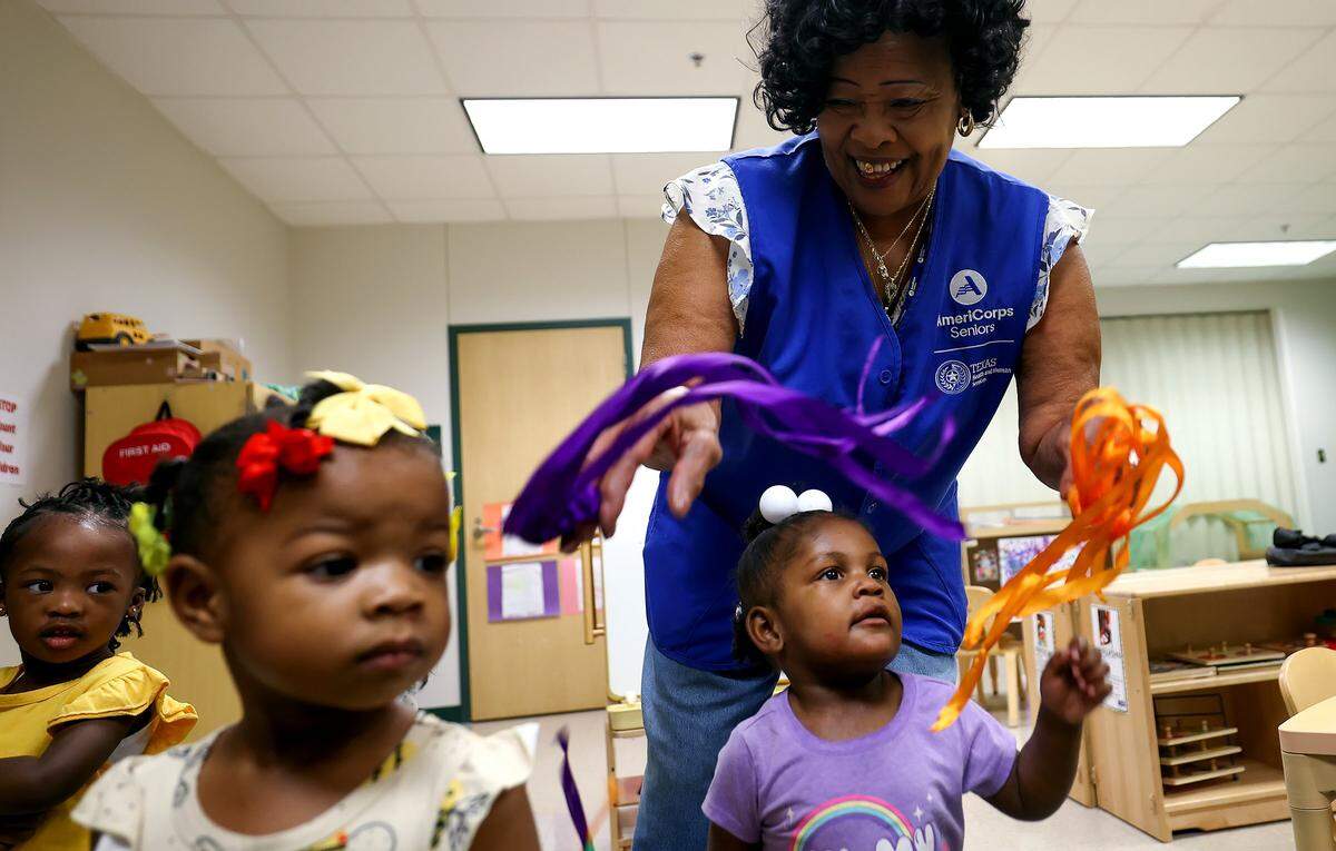 Wanda Fields, 75, interacts with children at the Early Head Start program at J.A. Hargrave Elementary School on Monday, Sept. 15, 2025, in Fort Worth. Fields spends 20 hours a week volunteering through the Texas Health and Human Services' Foster Grandparent program.
