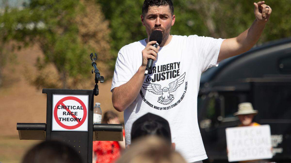Nate Schatzline, a Republican who’s running to replace Matt Krause in the state legislature, speaks out against the Fort Worth school district’s equity efforts during a Liberty Rally on Tuesday.