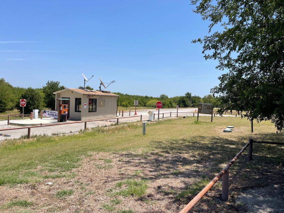 Benbrook Lake’s north entrance gate to Holiday Park on Lakeview Drive. Cyclists have been noted going through the gate without stopping, showing their IDs or park passes or paying the park fees, which are posted on the sign to the right.