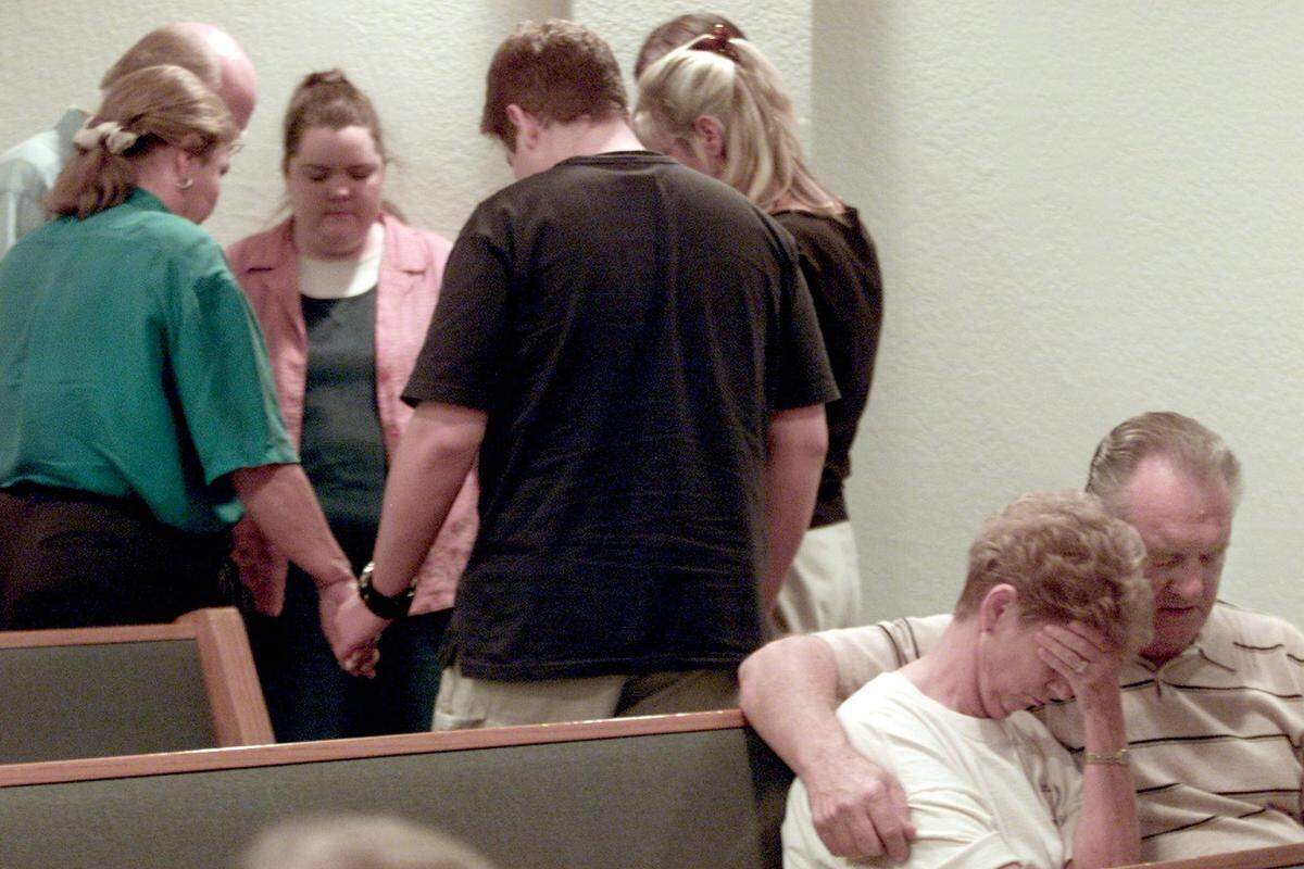 Members of the Wedgwood Baptist Church break up into small prayer groups during a prayer service on Sept. 12, 2001.