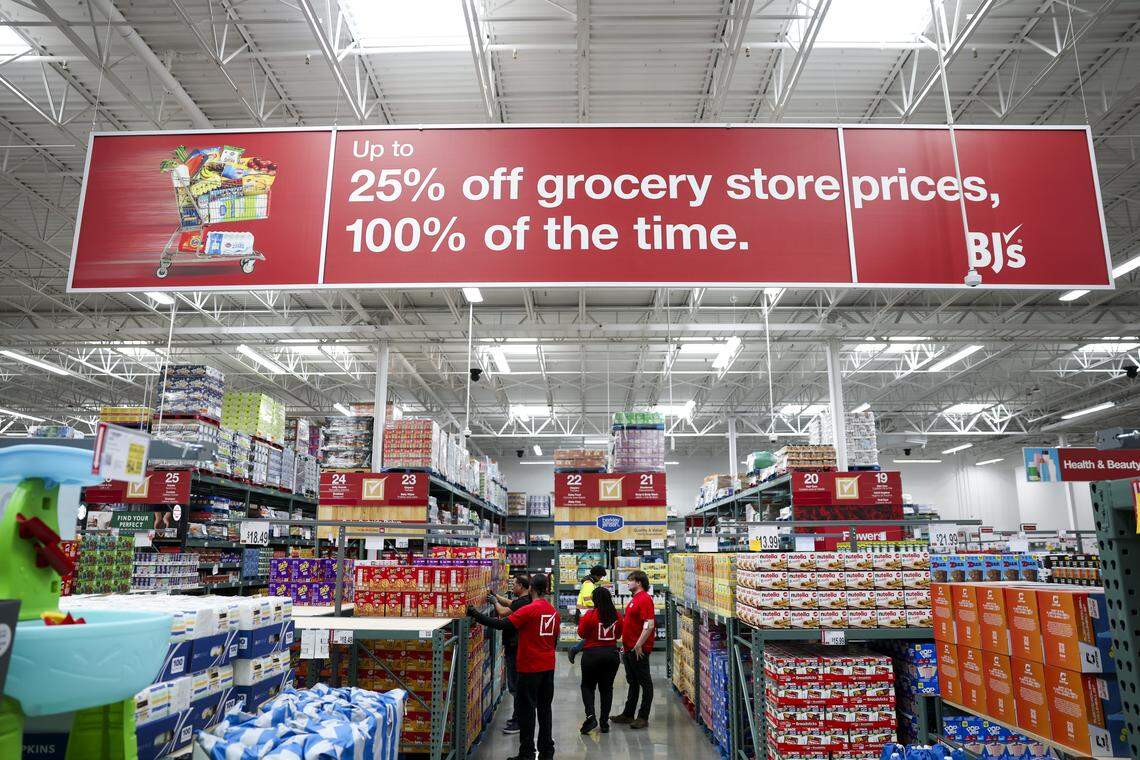 Workers stock the shelves of BJ's Wholesale Club at 7241 Harris Parkway on Friday, April 24, 2026 in Fort Worth, Texas. BJ's Wholesale Club touts its low grocery store prices, claiming customers save up to 25% off.