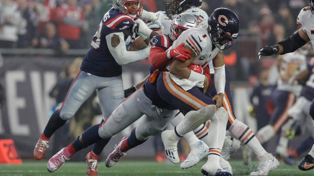 New England Patriots linebacker Matthew Judon (9) sacks Chicago Bears quarterback Justin Fields (1) during the first half of an NFL football game on Monday. The Cowboys’ defense figures to cause Fields more problems on Sunday.
