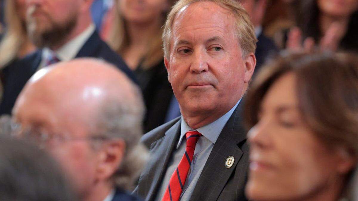 Texas Attorney General Ken Paxton attends the executive order signing ceremony to reduce the size and scope of the Education Department in the East Room of the White House on March 20, 2025, in Washington.