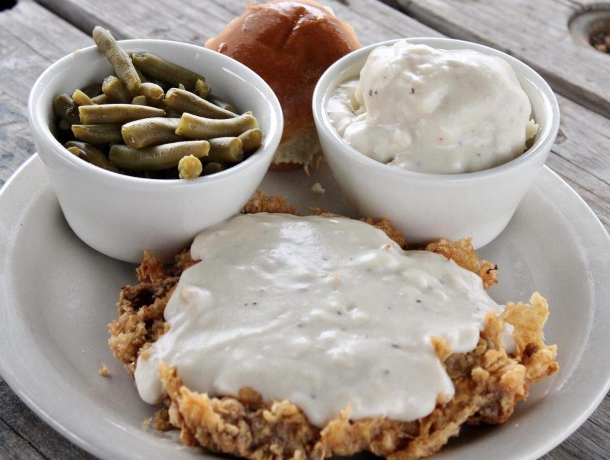Chicken-fried steak also comes in a family dinner pack at Rufus Bar & Grill in Cityview Centre.