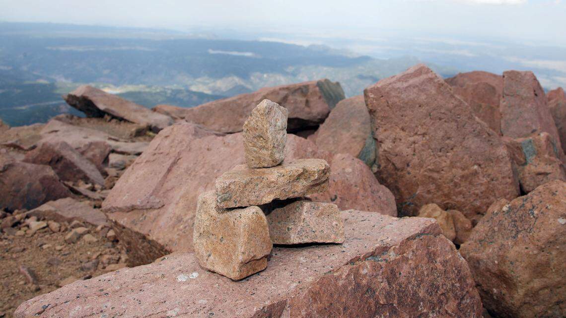 A stone cairn stands on the summit of Pike’s Peak on Thursday, May 25, 2006, near Manitou Springs, Colo. (AP Photo/David Zalubowski)
