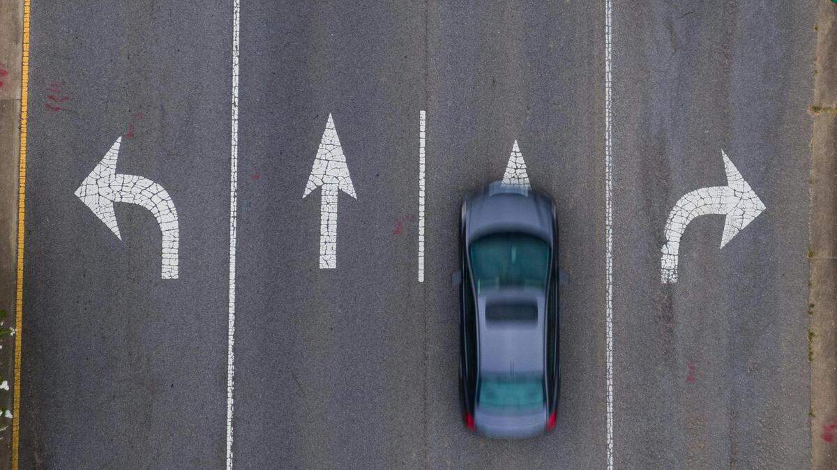 Texas Transportation Code says that it is illegal for cars to stop, stand or park in an intersection. However there are a few exceptions.