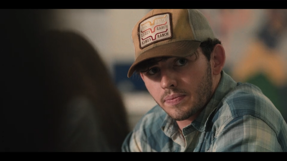 Carter (Finn Little) wears a Kimes Ranch hat in “Dutton Ranch” season 1, episode 1.