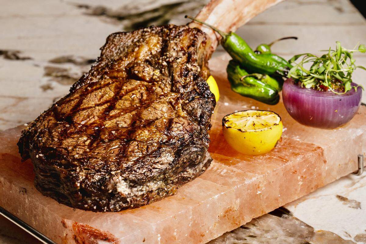 A Father’s Day surf-and-turf special at Toro Toro in Fort Worth will feature a 7-ounce rib-eye steak (shown) with jumbo prawns and potatoes au gratin.