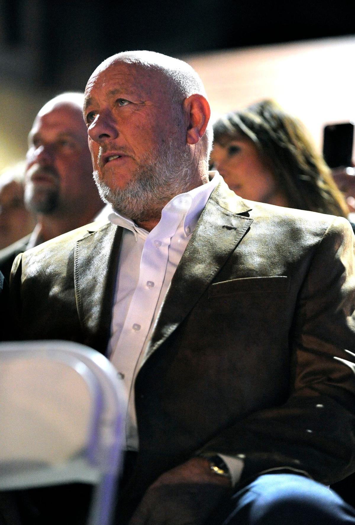 Farris Wilks watches U.S. Senator and presidential candidate Ted Cruz deliver his remarks in December of 2015 at the Myrtle Wilks Community Center in Cisco.