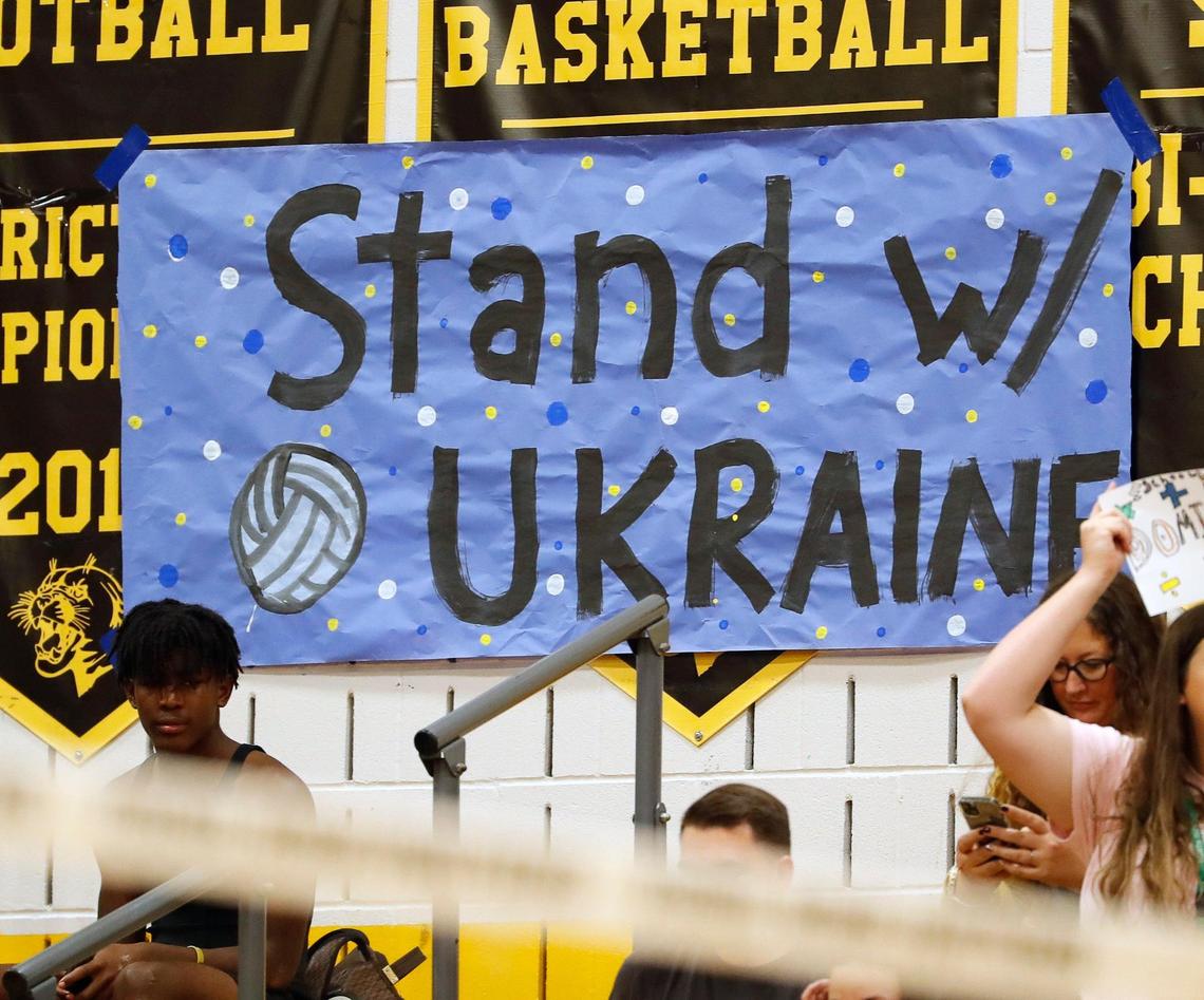 The gym had several signs supporting Ukraine and senior Ruslana Plaksii.